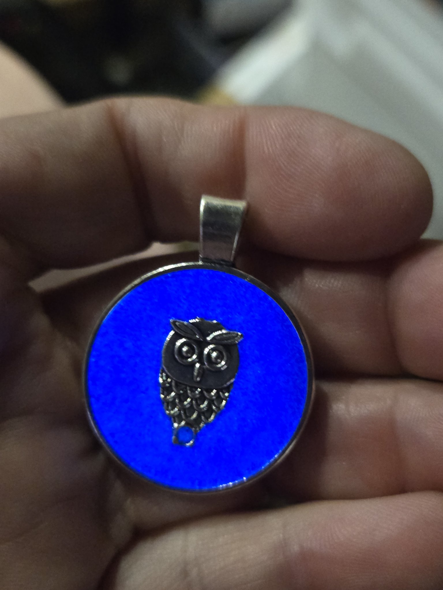 Stock 200 owl resin pendant glowing blue in the dark