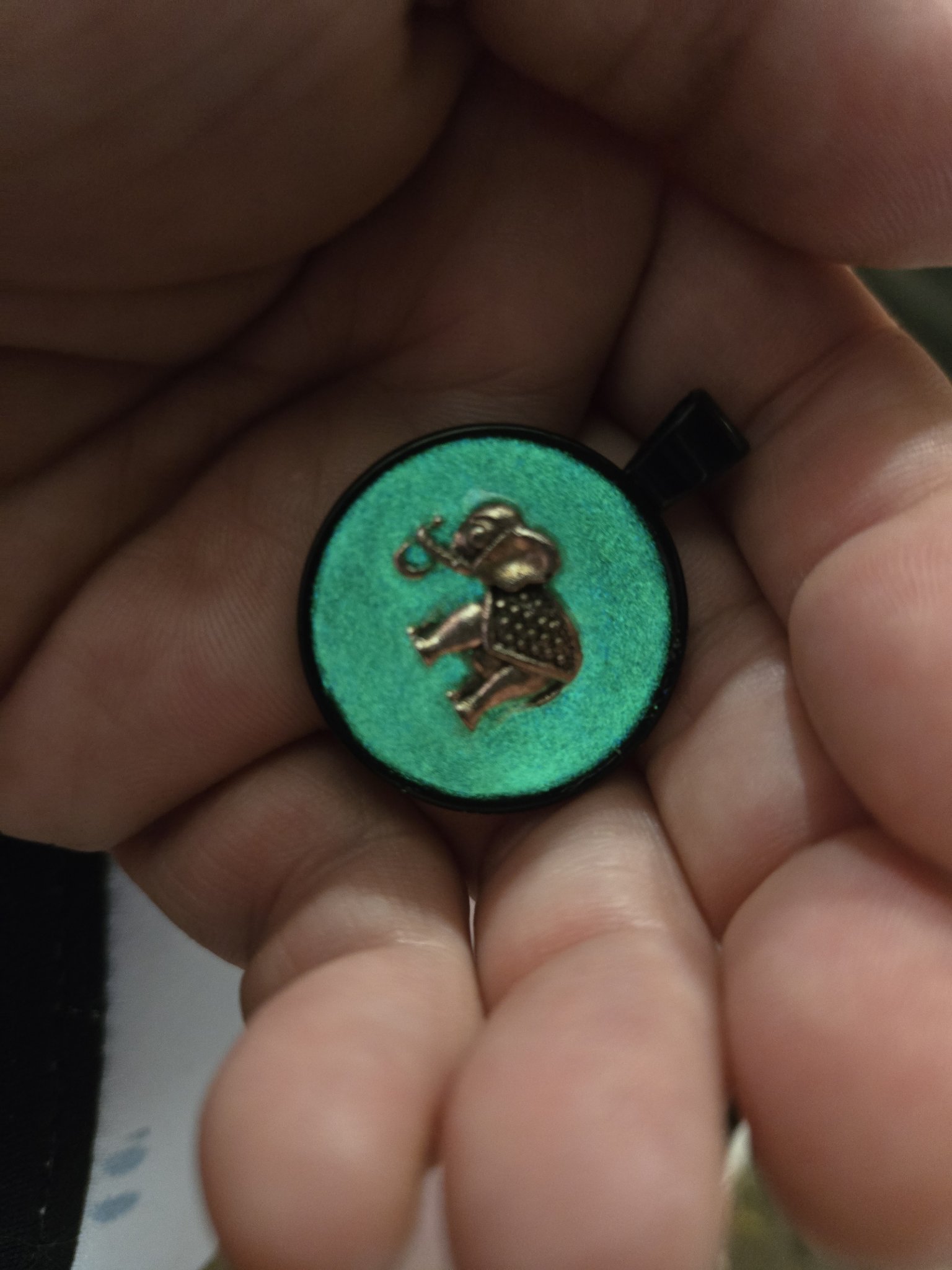 Stock 168 elephant pendant glowing in the dark