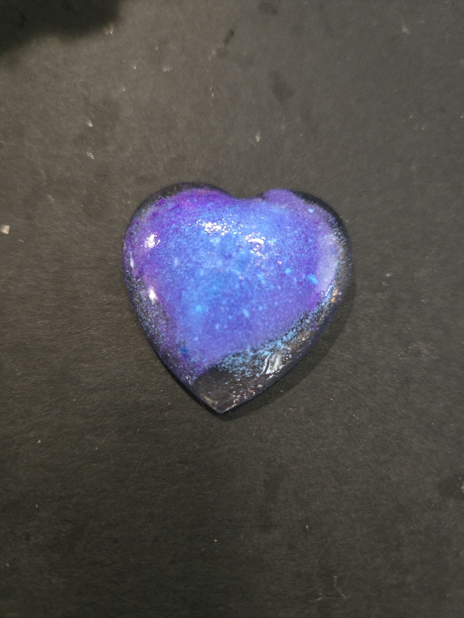 Back and angled view of stock 197 heart-shaped resin pendant
