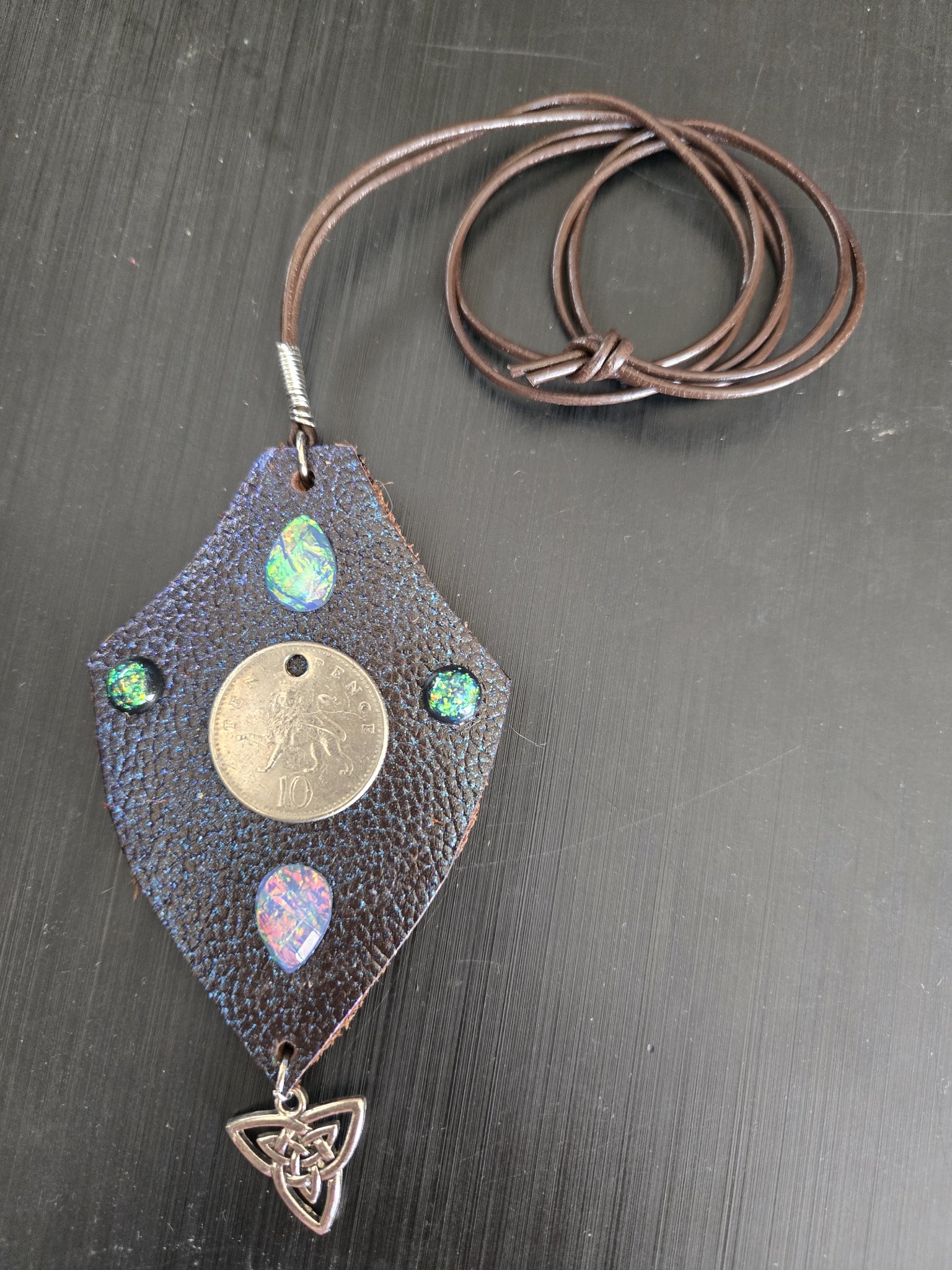 Front view of stock 175 buffalo leather Celtic shield pendant with its 30-inch brown leather necklace