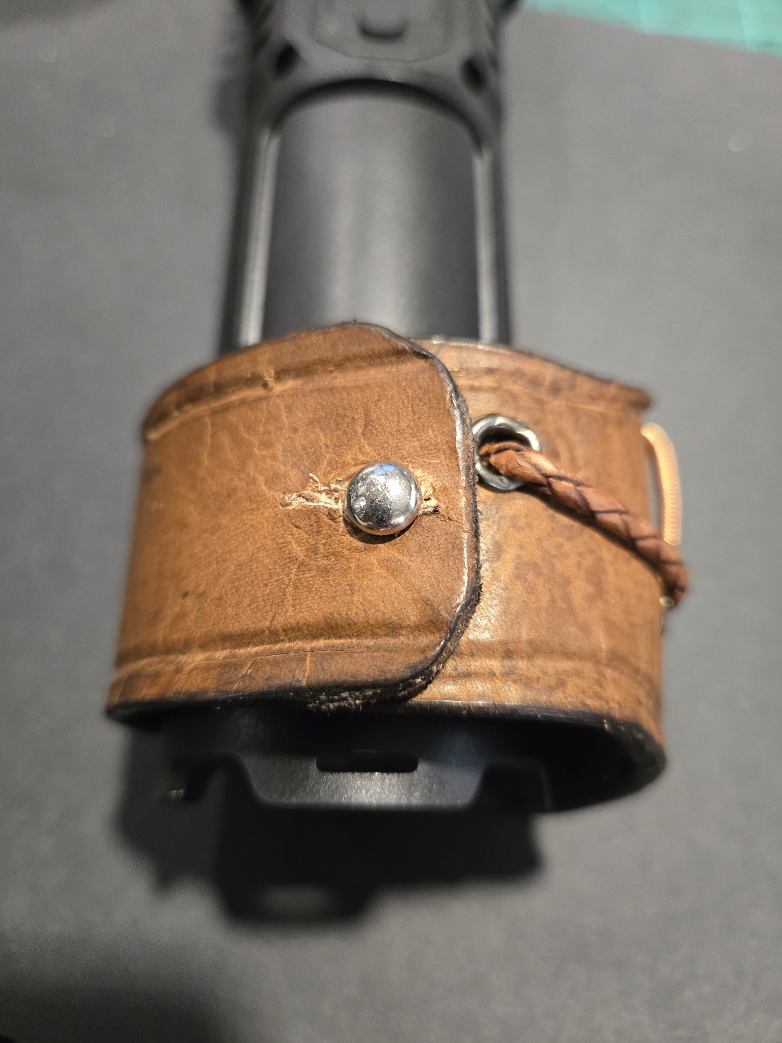 Back view of stock 215 showing its fixed button closure