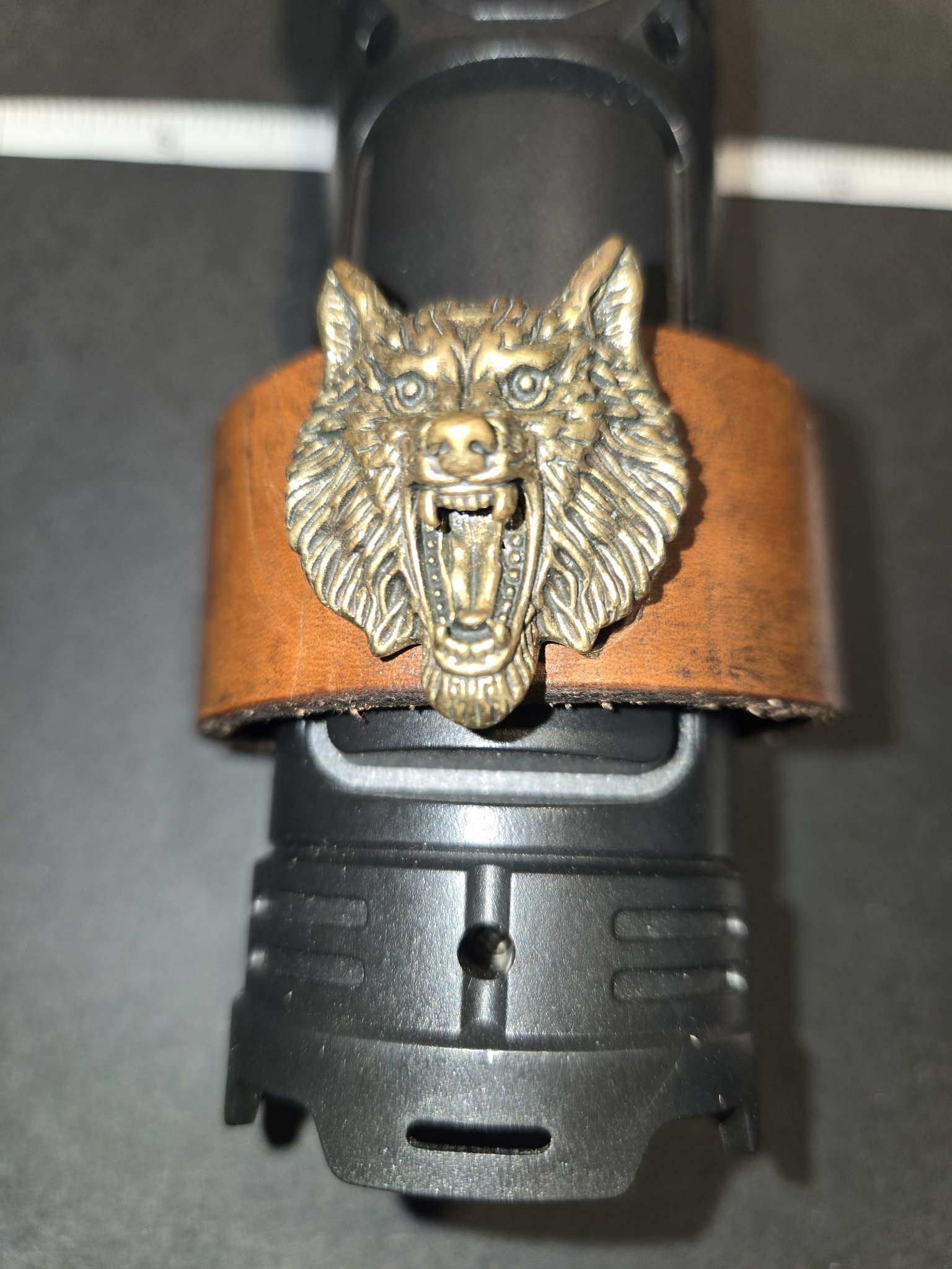 Stock 222 standing on display showing the bronze wolf head