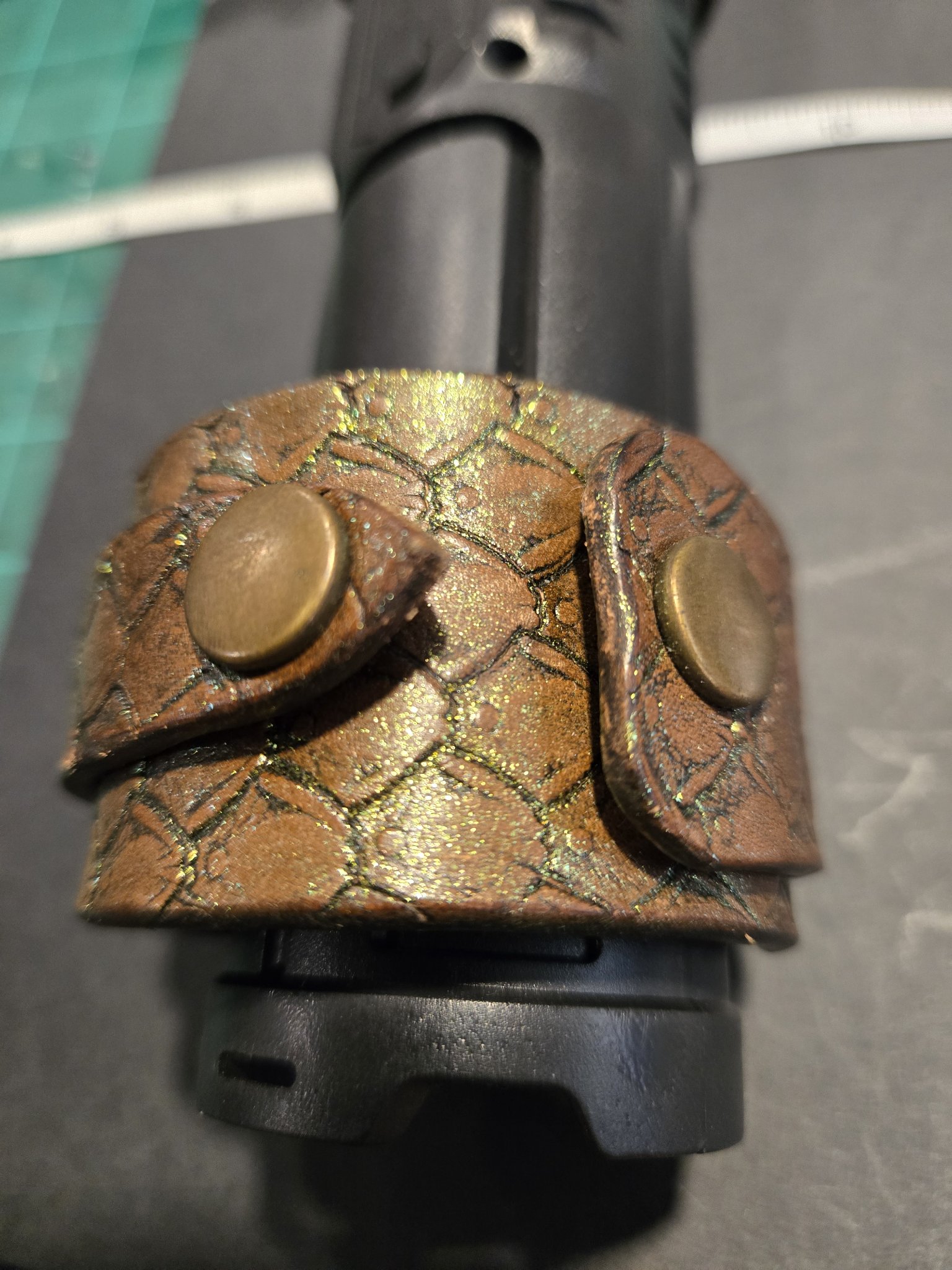 Stock 223 on display showing its bronze snap closures