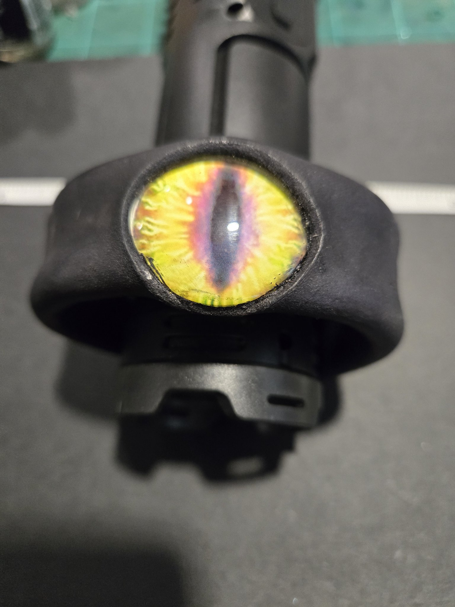 Stock 227 standing on display showing its fiery yellow dragon eye and open cuff shape