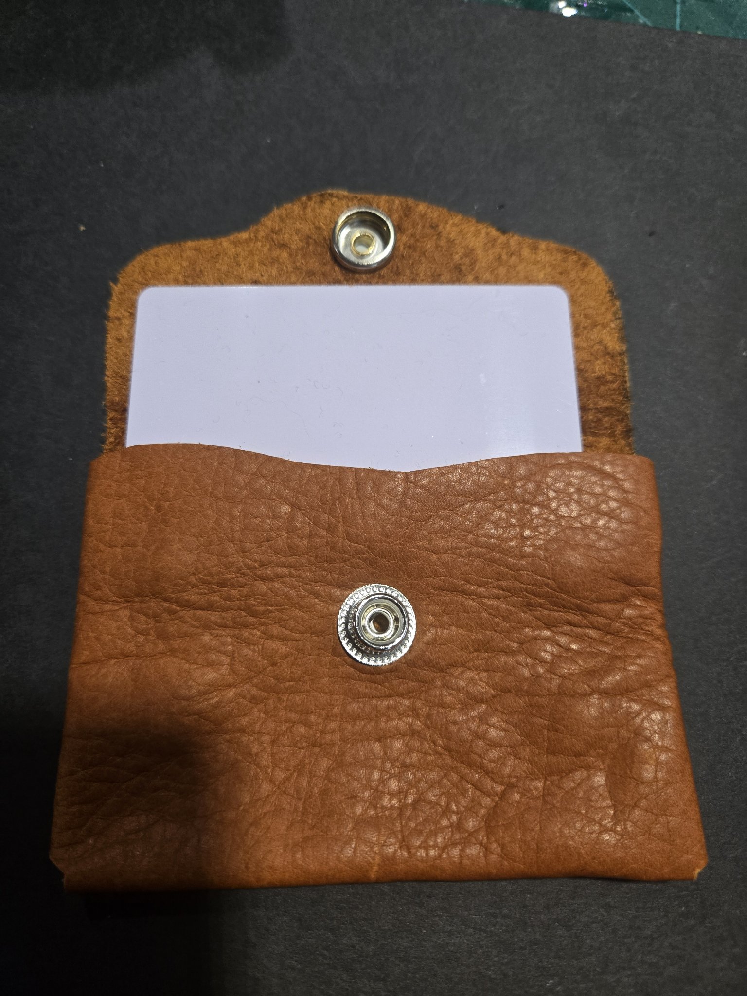 Stock 243 open with a card tucked inside, shown for size only