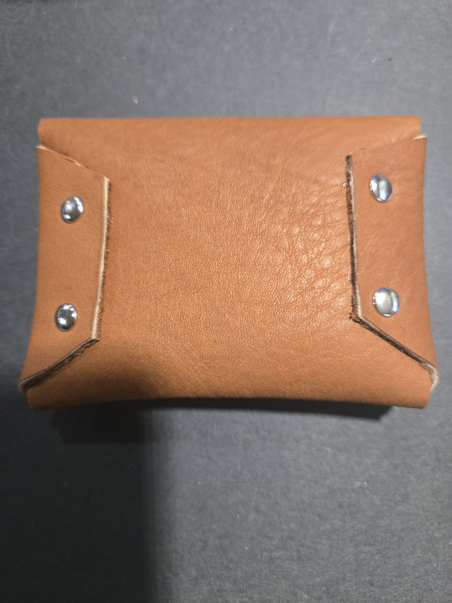 Back of stock 244 showing the riveted sides with silver-tone rivets