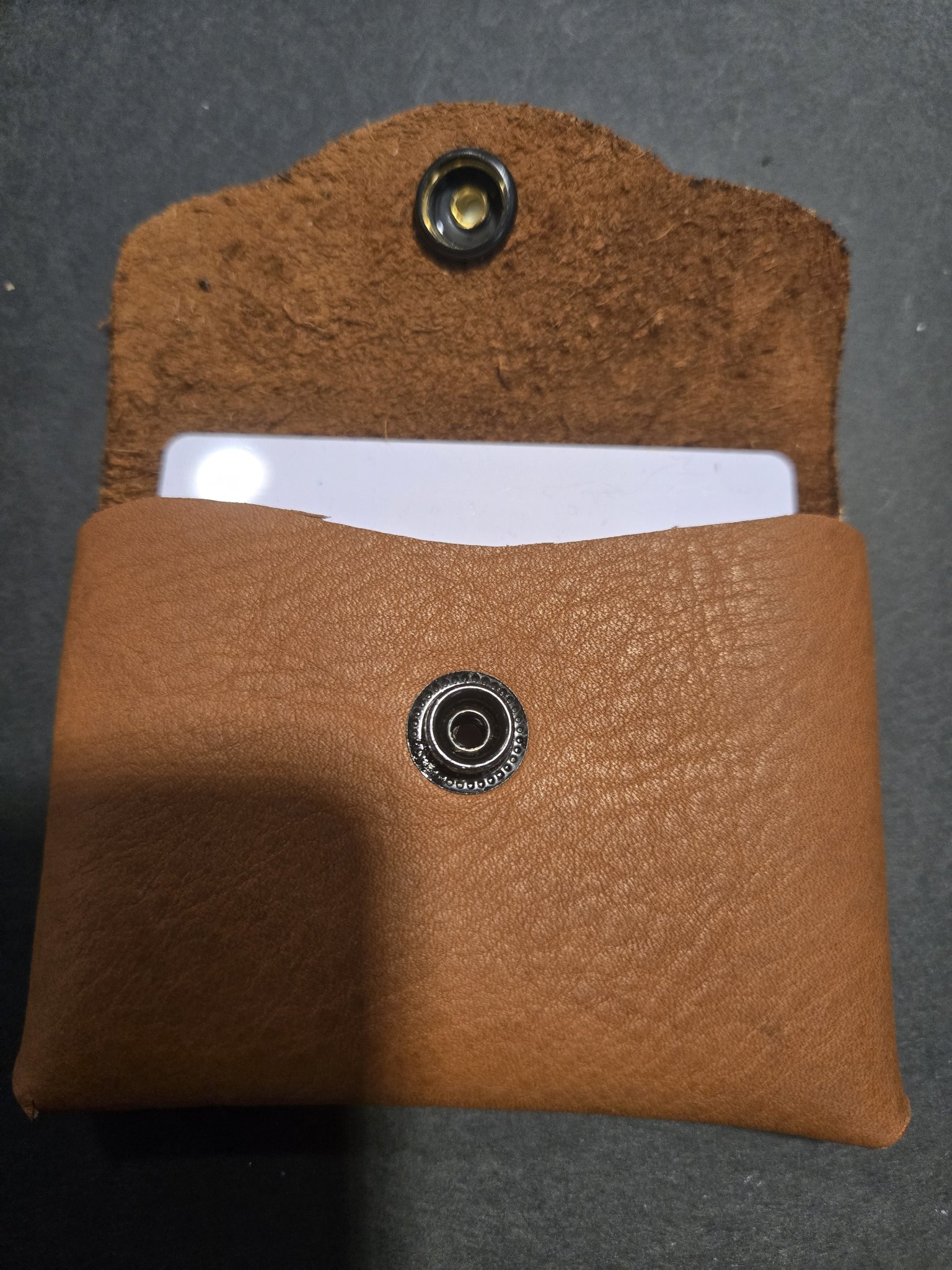 Stock 244 open with a card tucked inside, shown for size only